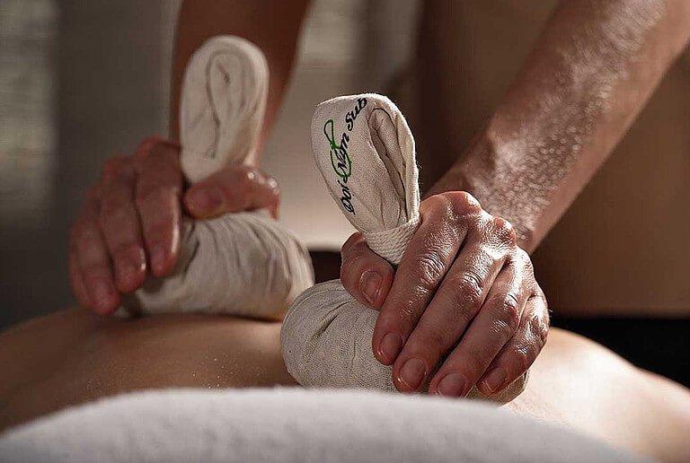 Herbal stamp massage at centrovital Day Spa